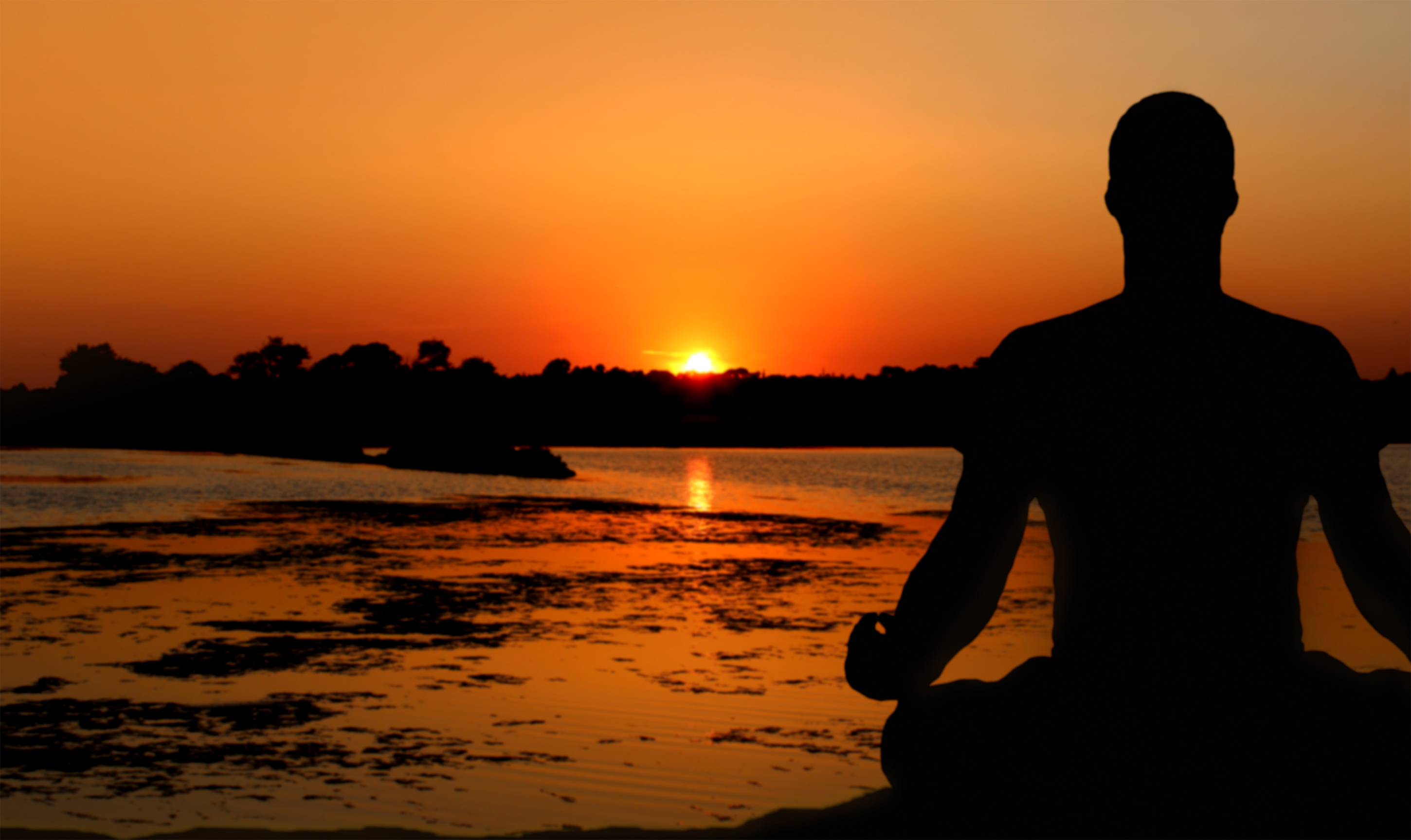 Meditating at the sunset